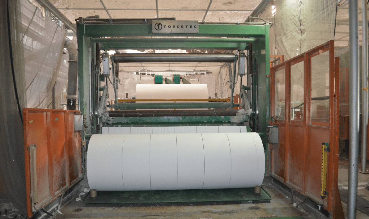 Rewinder combiner of second tissue line in operation