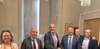 ITA Holding acquires Sipack; Sipack founder and Chief Executive Walter Pacioni (left), shakes hands with ITA Holding shareholder Mauro Celli