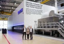Aiming to drive a completely new, scalable decarbonisation process across the global paper industry: (L-r) Jonas Bergström, Elena Viviani, and Matthias Höhsl in front of the pilot installation at Voith in Heidenheim, Germany