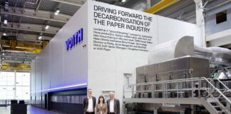 Aiming to drive a completely new, scalable decarbonisation process across the global paper industry: (L-r) Jonas Bergström, Elena Viviani, and Matthias Höhsl in front of the pilot installation at Voith in Heidenheim, Germany