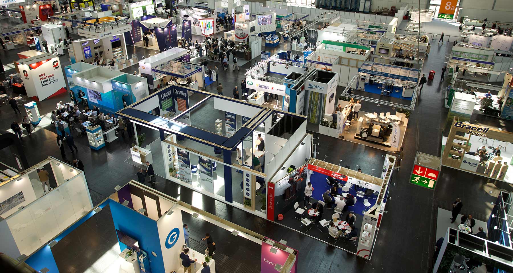 Contacts and contracts: business deals signed at the exhibition are now being rolled out across global industry networks 